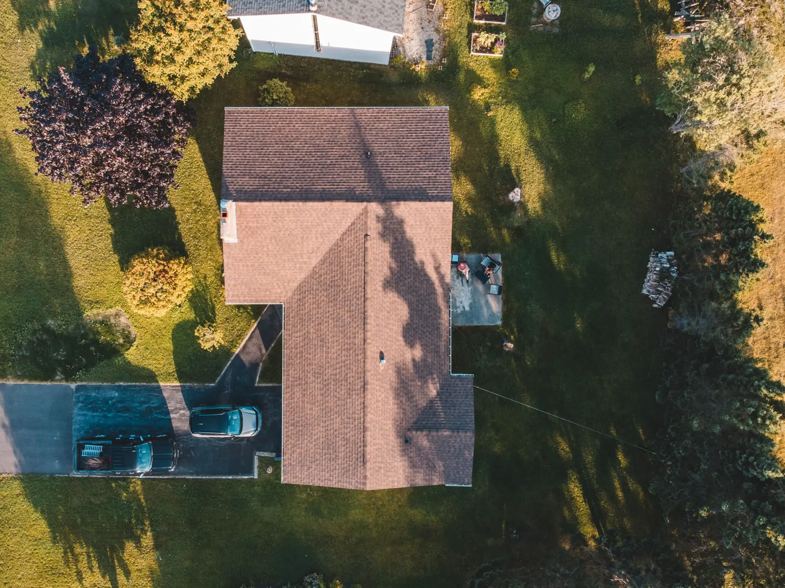 Roofer reviewing paperwork on a job site